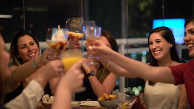 Women get together to enjoy a friendly dinner