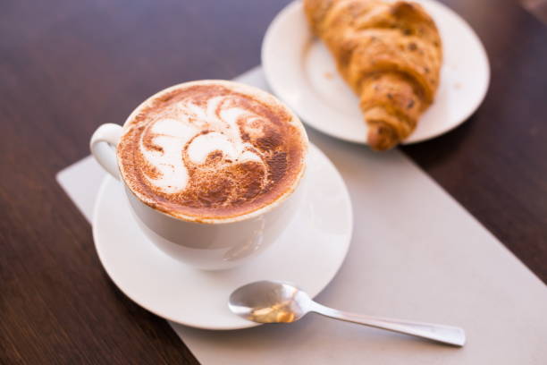 istock Food. Cappuccino and croissant 1085341814