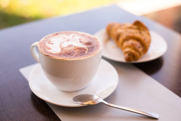 istock Food. Cappuccino and croissant 1085341972