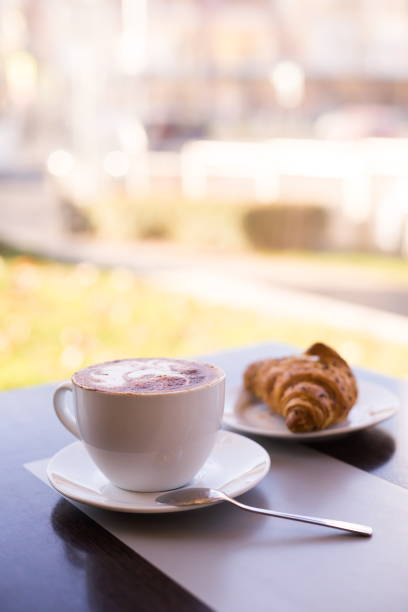 Food. Cappuccino and croissant