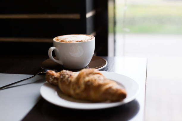 istock Food. Cappuccino and croissant 1085342098