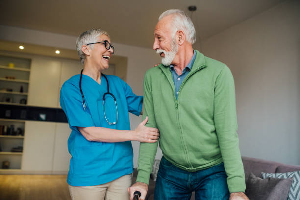 istock Happy patient looking at caregiver 1085347522