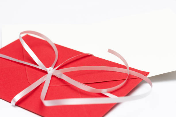 istock Blank red envelope isolated on white background with shadows. Mockup, Christmas mailing. declaration of love. 1085351012