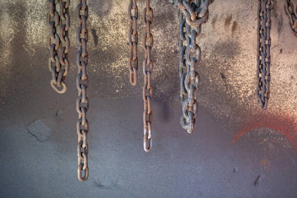 istock Heavy lift chain hang on the wall 1085351228