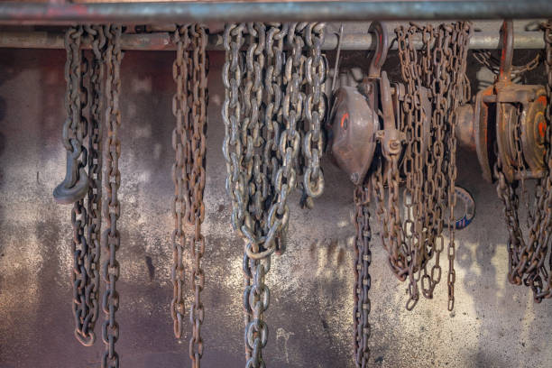 istock Heavy lift chain hang on the wall 1085351296