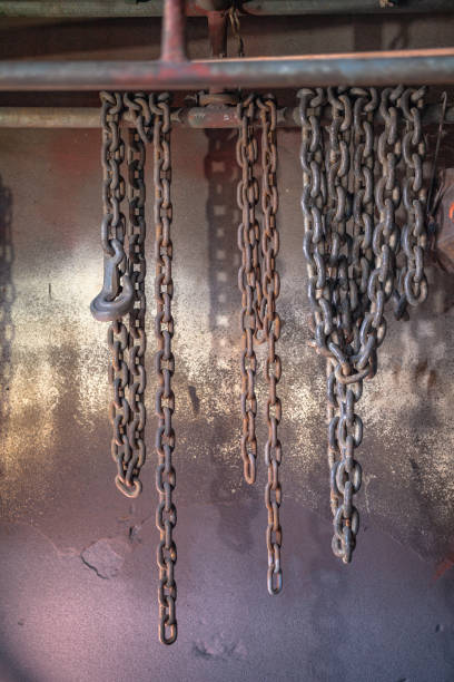 istock Heavy lift chain hang on the wall 1085351354