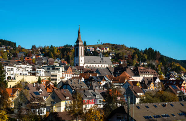 panorama of titisee neustadt in the black forest with church, germany - black forest forest sky blue imagens e fotografias de stock