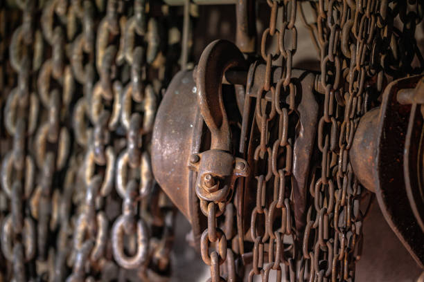 istock Heavy lift chain hang on the wall 1085352664