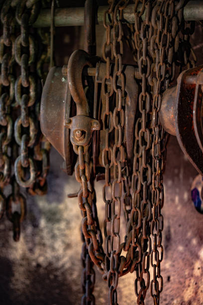 istock Heavy lift chain hang on the wall 1085352714