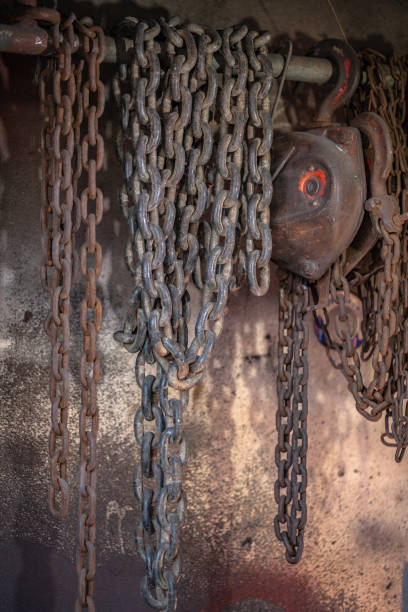 istock Heavy lift chain hang on the wall 1085352802