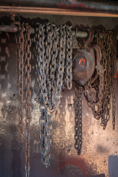 istock Heavy lift chain hang on the wall 1085352804