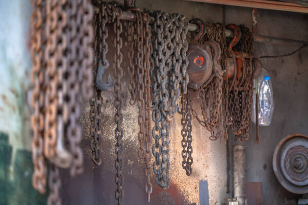istock Heavy lift chain hang on the wall 1085352878