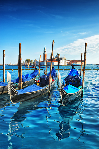 The Venetian Lagoon with docked gondolas.