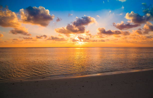 istock Maldives,  tropical sea background sunset 1! 1085357814