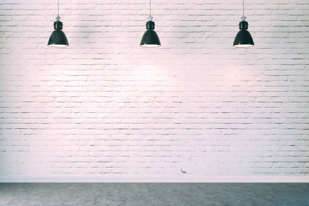 istock 3d room with white brick wall and ceiling lamp 1085375512