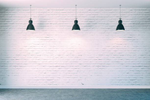 istock 3d room with white brick wall and ceiling lamp 1085375514