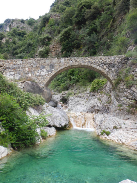 istock Stone bridge in mountains in the Nervia Valley 1085381784