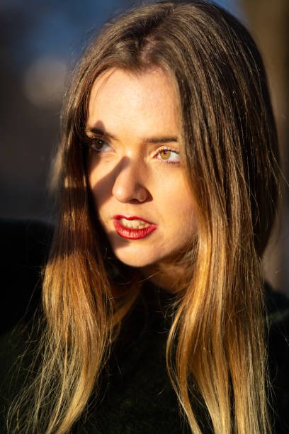 istock Young woman covering face from sunlight 1085386512