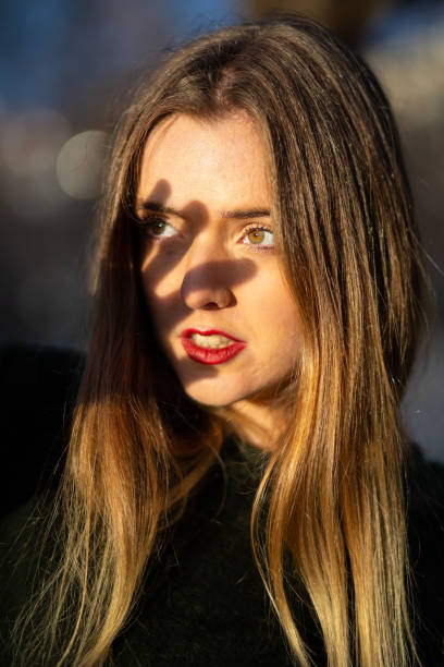 istock Young woman covering face from sunlight 1085386516