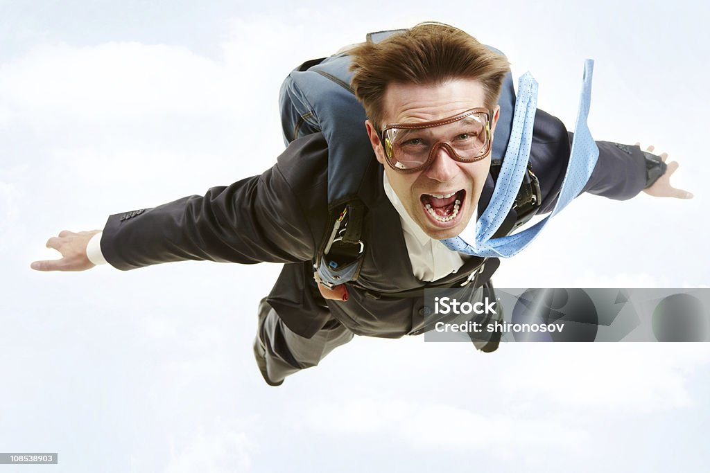 Homme volant - Photo de Parachute libre de droits