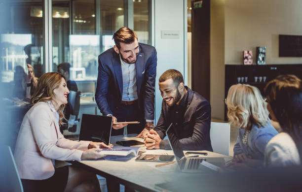 Business People Working in The Office Business People Working in The Office staff meeting stock pictures, royalty-free photos & images