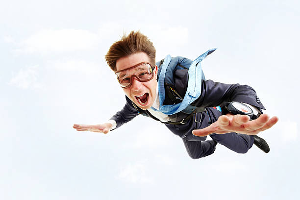 istock A man in a blue suit and goggles parachuting 108538990