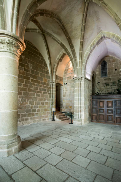 Chapel of Notre-Dame-sous-Terre at Mont Saint Michel abbey Visitors at the Chapelle Notre-Dame-sous-Terre at Mont Saint Michel abbey. Le Mont-Saint-Michel is an island commune in Normandy, at the mouth of the Couesnon River. sous terre stock pictures, royalty-free photos & images