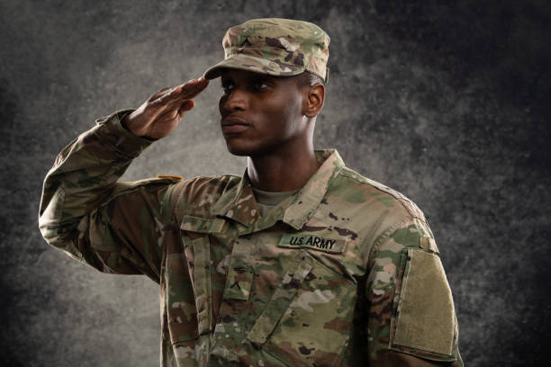 Soldier US Army African American Soldier wearing the new official Operational Camouflage Pattern (OCP) uniform. Model is an actual service member of the US military. black military man stock pictures, royalty-free photos & images