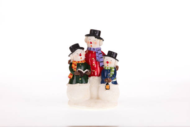 istock decorative christmas snowmen on white isolated background 1085401438