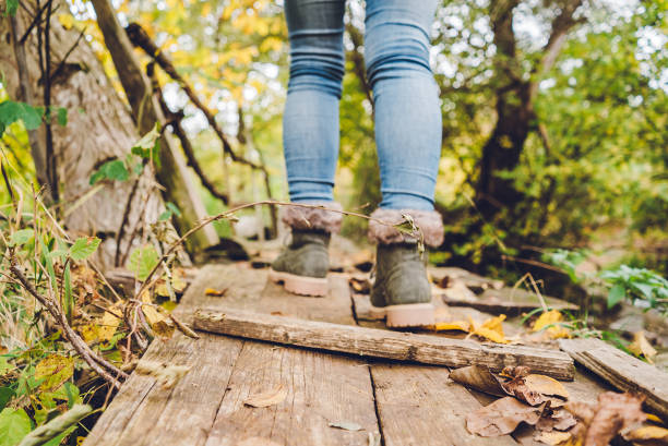 istock Female feet on mountain bridge 1085416160