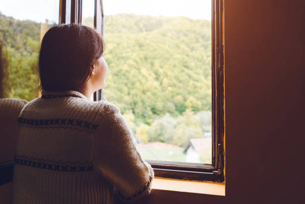 istock Woman in mountain cabin 1085416290