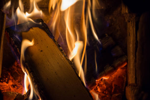 istock Firewood burning in the fireplace 1085435678