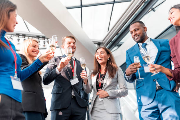istock Businesspeople celebrating with champagne 1085435908