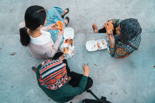 istock Generation Z girls eating on the go. 1085437792