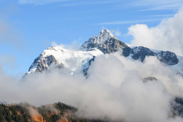 istock Clouds sweep over Mt Shuksan face in the Cascade Range during Autumn, Washington-USA 1085441666