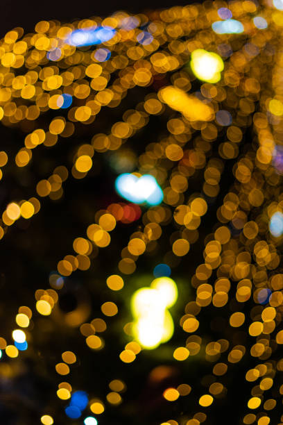 istock Abstract new year tree background, decorated with classical toys and illuminated with led lights 1085450108
