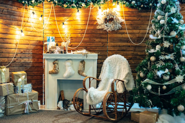 istock Romantic classical christmas interior with warm light, wooden elements and presents 1085450254