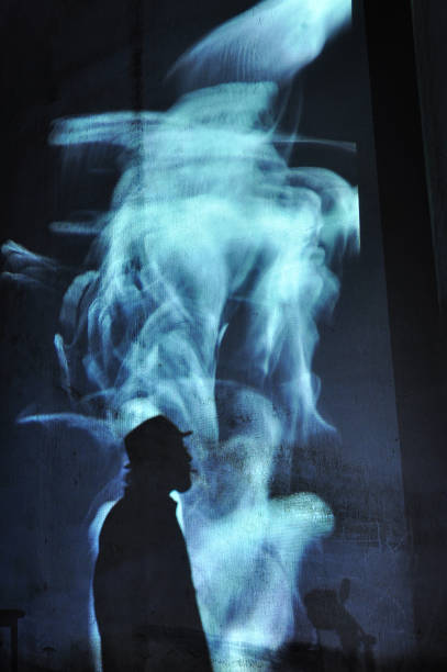 istock Shadow of unrecognizable man smoking a cigar 1085451762