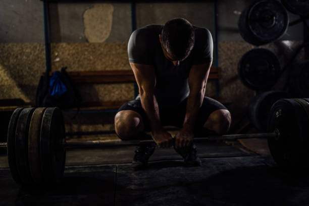 istock Body building in dark gym 1085466280
