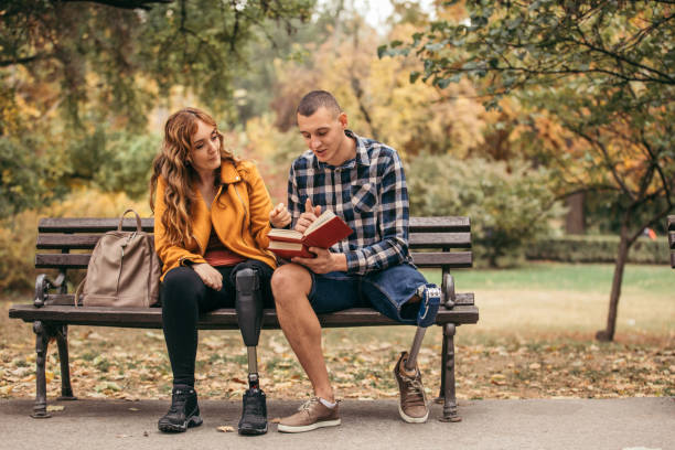 istock Couple studying together in park 1085466754