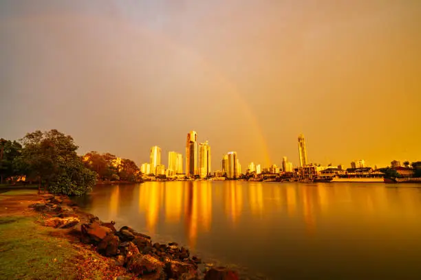 Photo of The Surfers Paradise skyline reflections at sunset with a rainbow