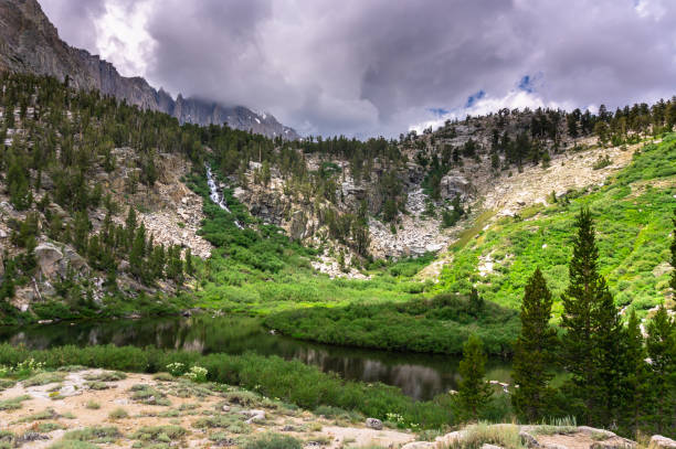 istock Little Pothole Lake in the High Sierra Under Threatening Sky 1085468514