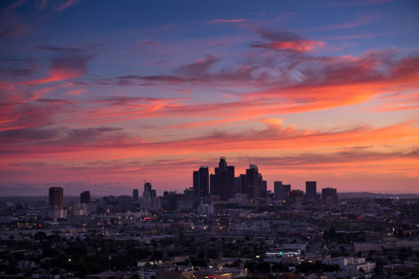 istock Downtown LA Skyline Beneath Red and Purple Sunset 1085468628