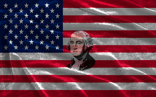 Closeup of United States of America flag with portrait George Washington close up