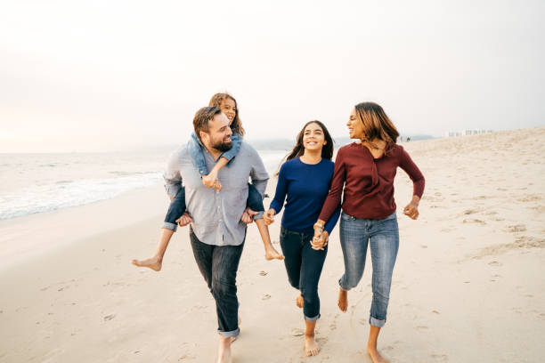 istock Sunset at the beach with family 1085472206