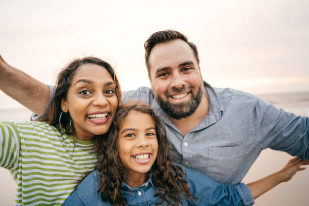 istock Family with one daughter looking to the camera 1085472210