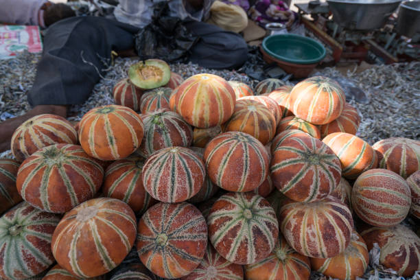 Fresh melons on local market stall , India