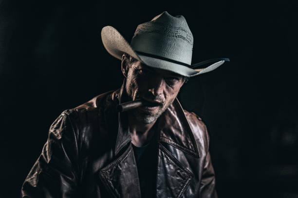 istock American cowboy smoking a cigar 1085509082