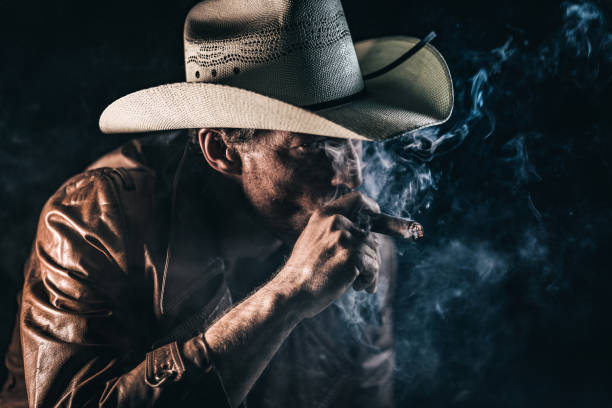 istock American cowboy smoking a cigar 1085509178