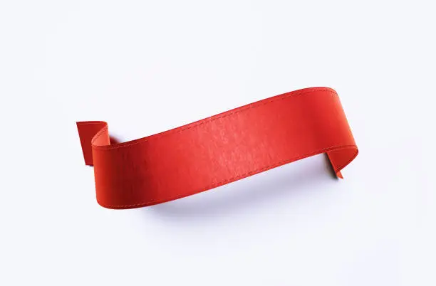 Red ribbon banner on white background Horizontal composition with clipping path.